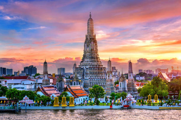 A vibrant Bangkok-inspired night with tropical cocktails, warm light, and shared plates